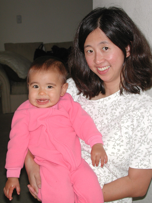 Rebecca shows off the very happy Maya in her cosy sleeper