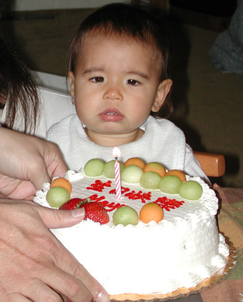 We carefully slide this cake in front of her