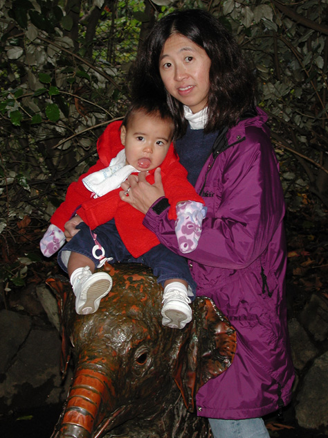 Rebecca and Maya ride an elephant