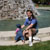 Maya and Mark play by the fountain