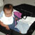 Maya is big enough now to pack herself 