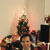 Maya, and Mark by the Christmas tree
