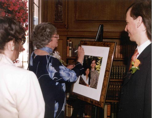 Signing the photo: Lori, Anne, and Mark